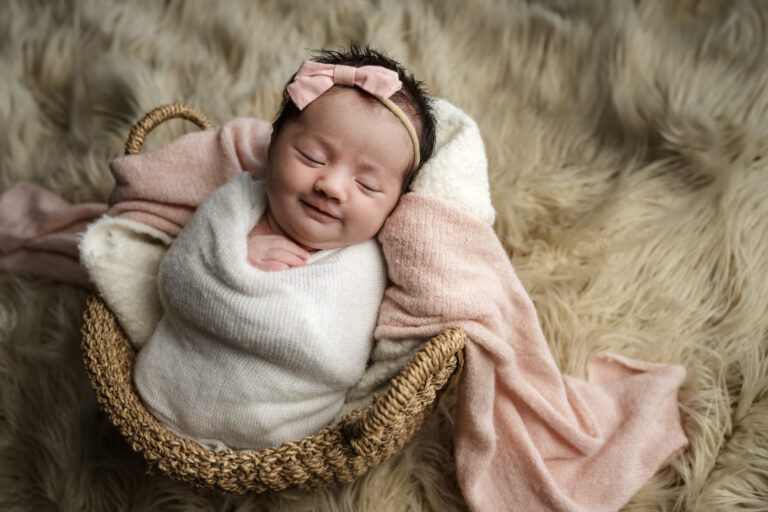 newborn-in-a-basket-bundled-in-a-blanket