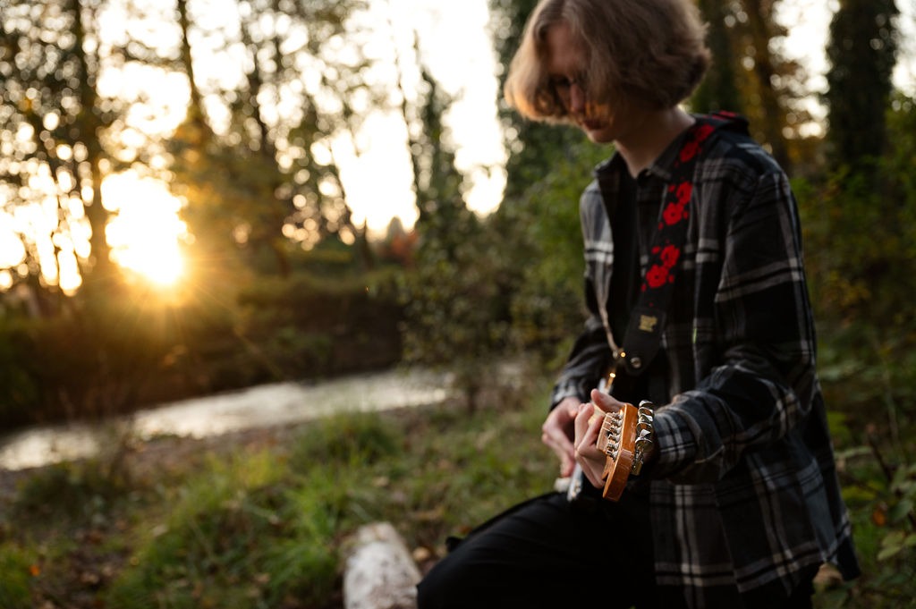 High-school-male-river-guitar-black