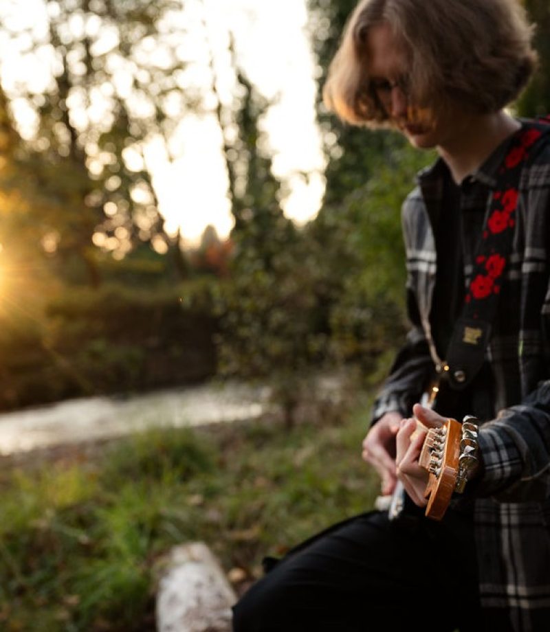 High-school-male-river-guitar-black