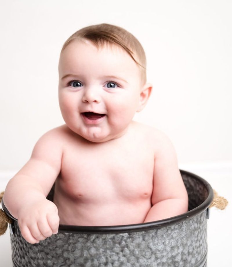 six-month-baby-in-studio-session-water-bucket